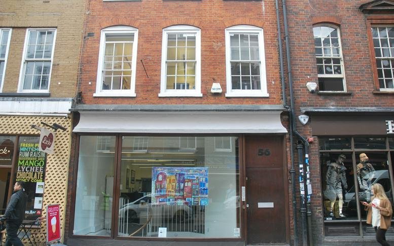 Exterior view of the red brick facade at 56, Greek Street, London.
