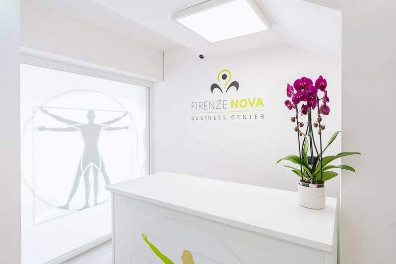 Spacious communal area with high-top tables, bar stools, and a vending machine.