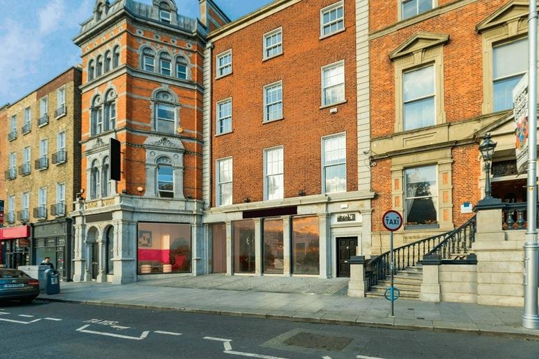 Exterior view of the historic red brick and stone facade of Smyth House at 6-7 Saint Stephen’s Green.