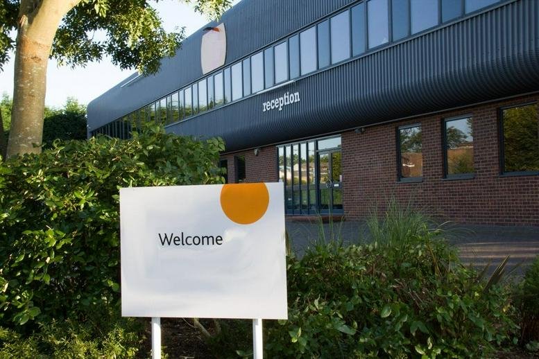 Exterior view of the dark metal and brick facade at 6-8 Revenge Road, Lordswood, Chatham.