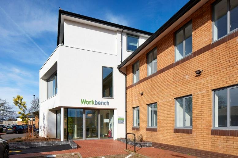 Exterior view of the brick and white facade building at 6 Ocean Way, Cardiff.