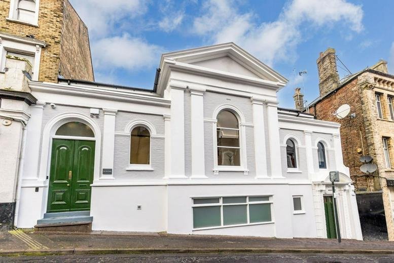 Exterior view of the white classical facade of 6 St Michael’s Road, The Lodge.
