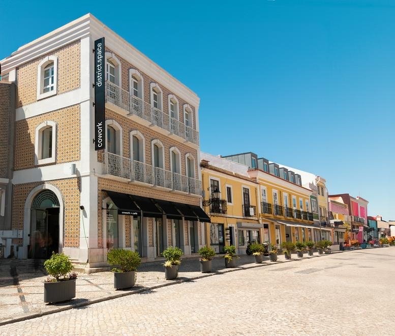 Exterior view of the historic brick and white facade building at 67, Rua Bocage, Setubal.