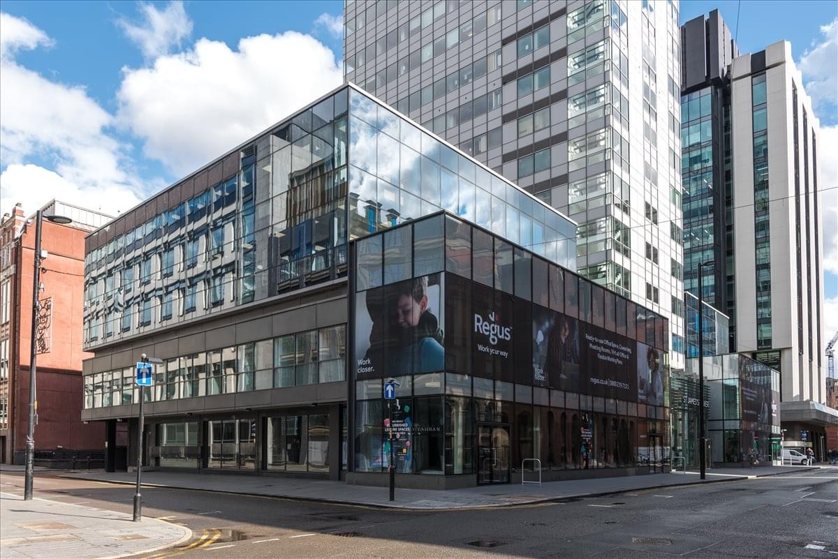 Exterior view of the contemporary glass and steel building facade at 7 Charlotte Street.