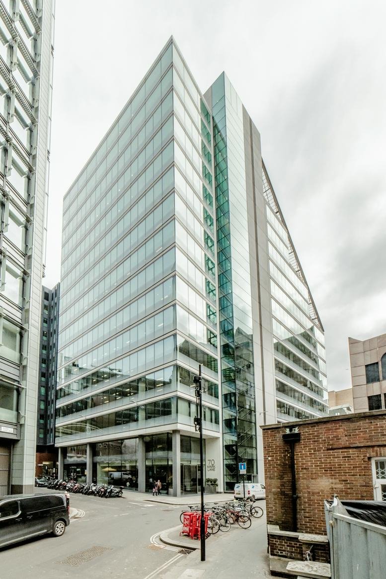 Exterior view of the contemporary glass and steel facade of 70 Mark Lane.