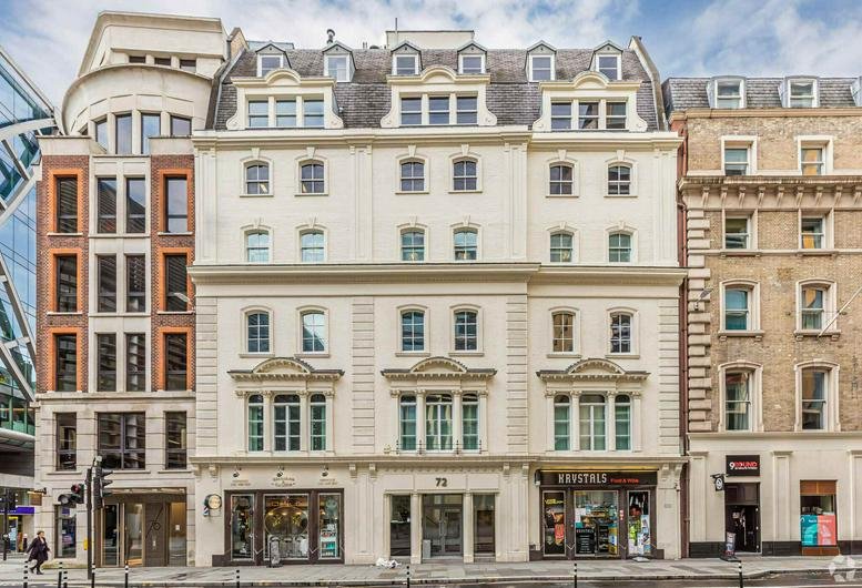 Exterior view of the classic stone and brick building facade at 72, Cannon Street, City of London.