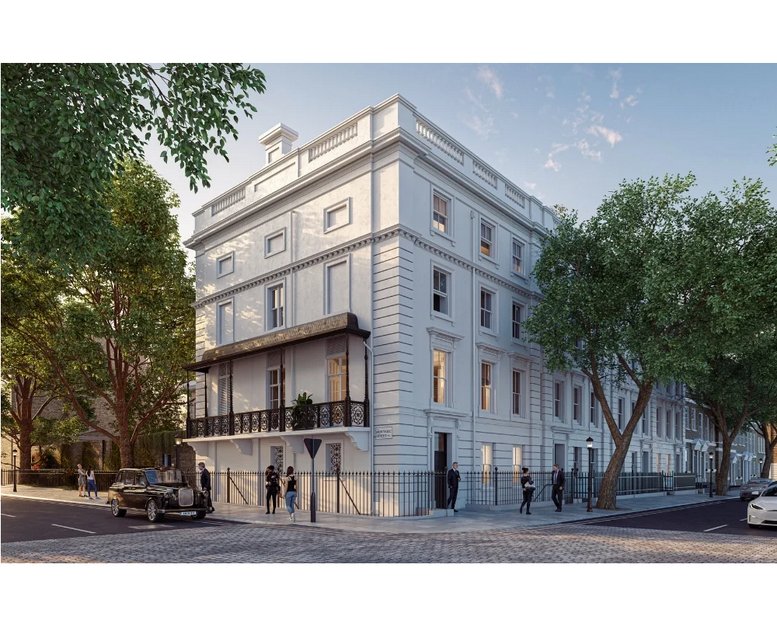 Classic white Georgian-style exterior facade of 74-77, Great Russell Street, London with a corner balcony.