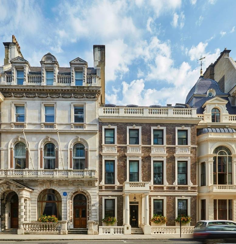 Exterior view of the historic stone and brick facade at 78-79 Pall Mall.