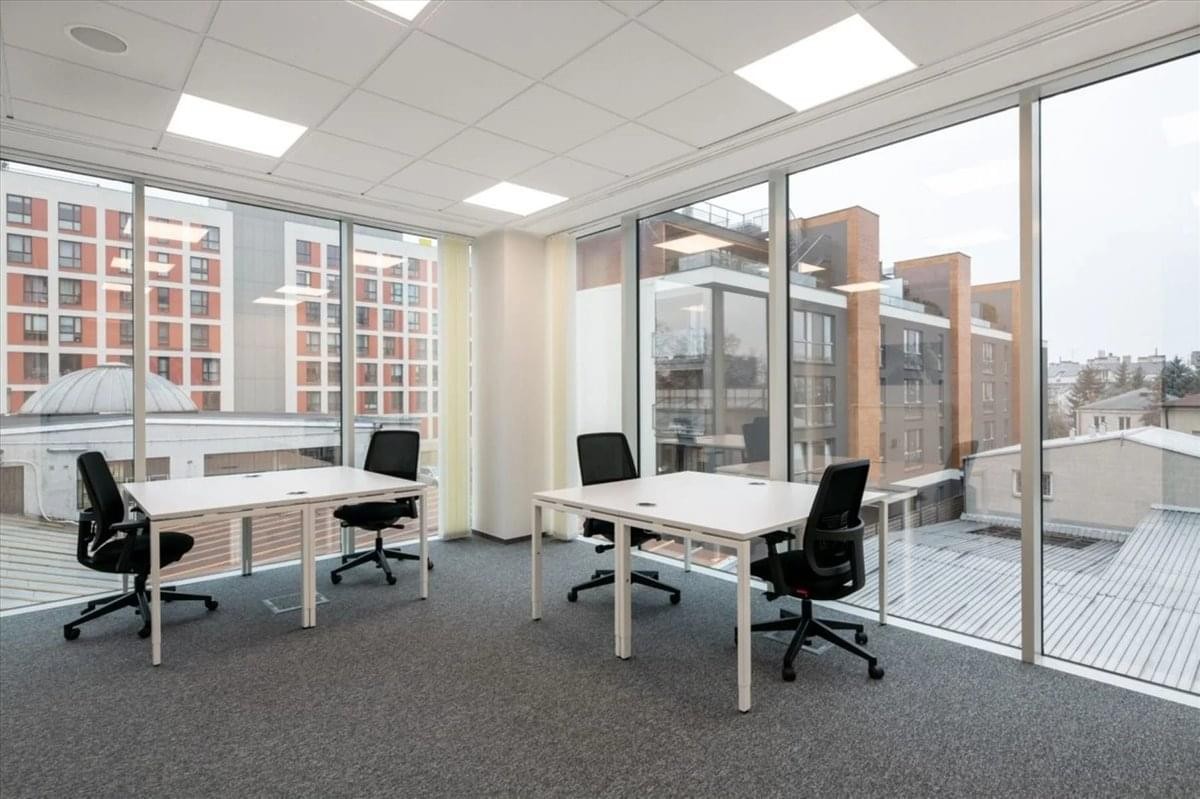 Spacious corner office at 7M Puszkarska street, Building H, Krakow with floor-to-ceiling windows.
