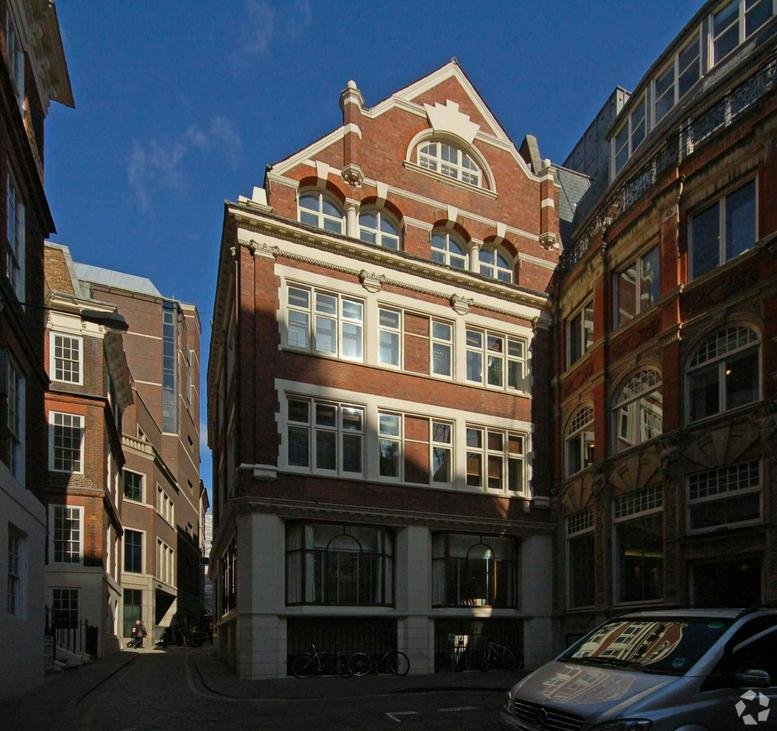 Exterior view of the historic red brick facade at 8 Laurence Pountney Hill, London.