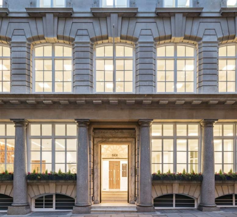 Grand stone facade and columned entrance of the 8, Lloyd’s Avenue building.