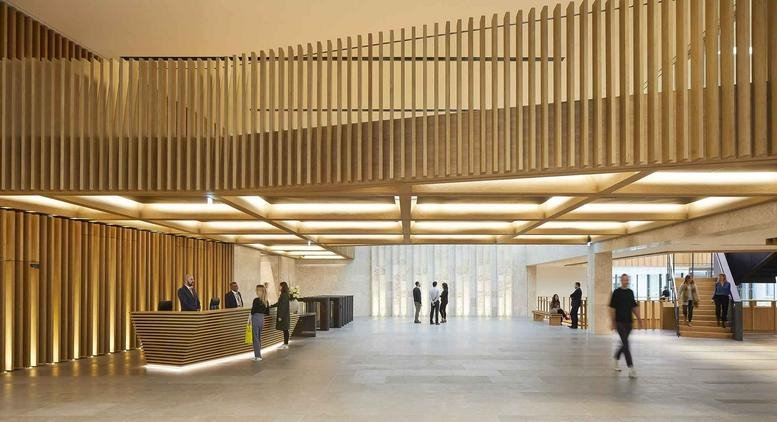 Spacious wood-paneled lobby and reception area at 80 Fenchurch Street.
