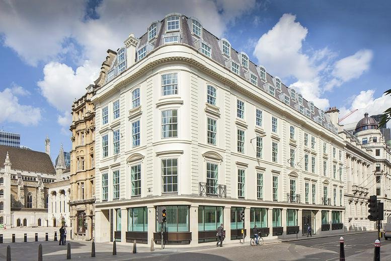 Exterior view of the classic stone and glass facade building at 85 Gresham Street.