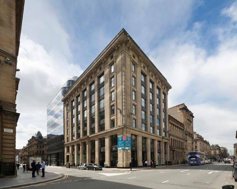 Exterior view of the historic stone facade at 9 George Square, Glasgow.