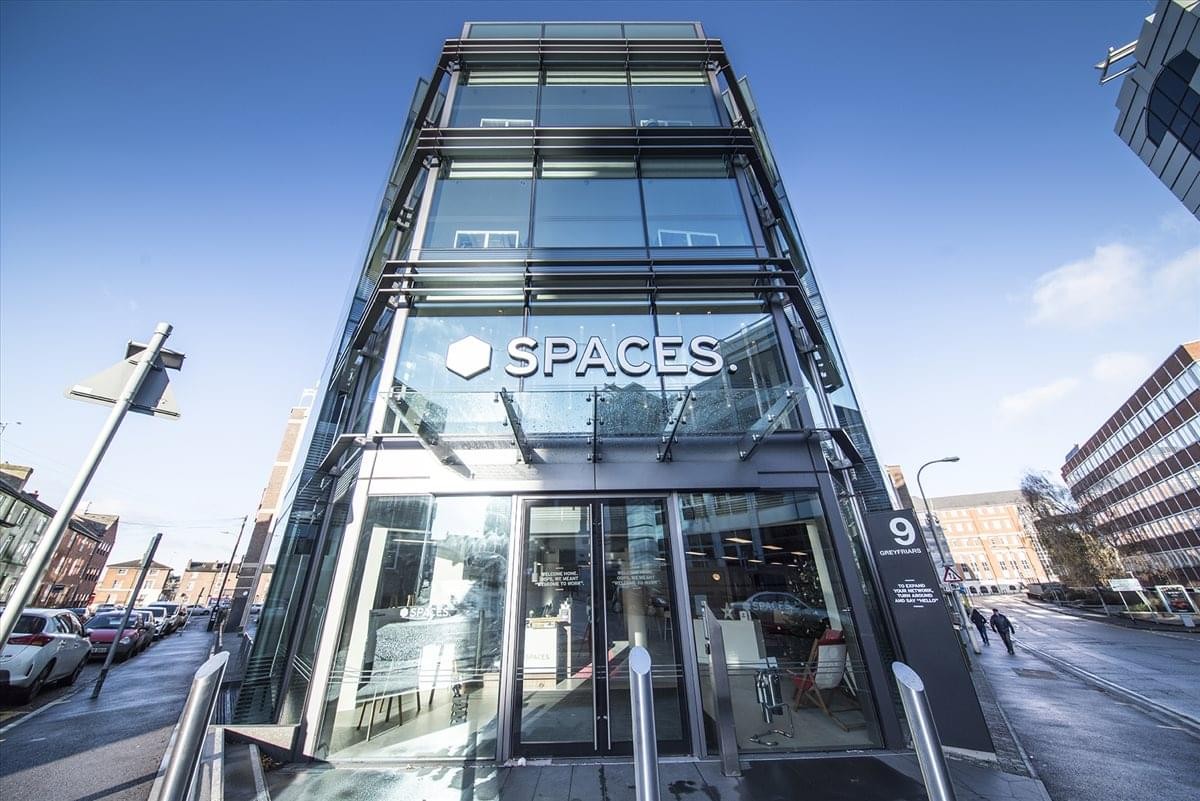 Exterior view of the glass-facade building at 9 Greyfriars Road, Reading.