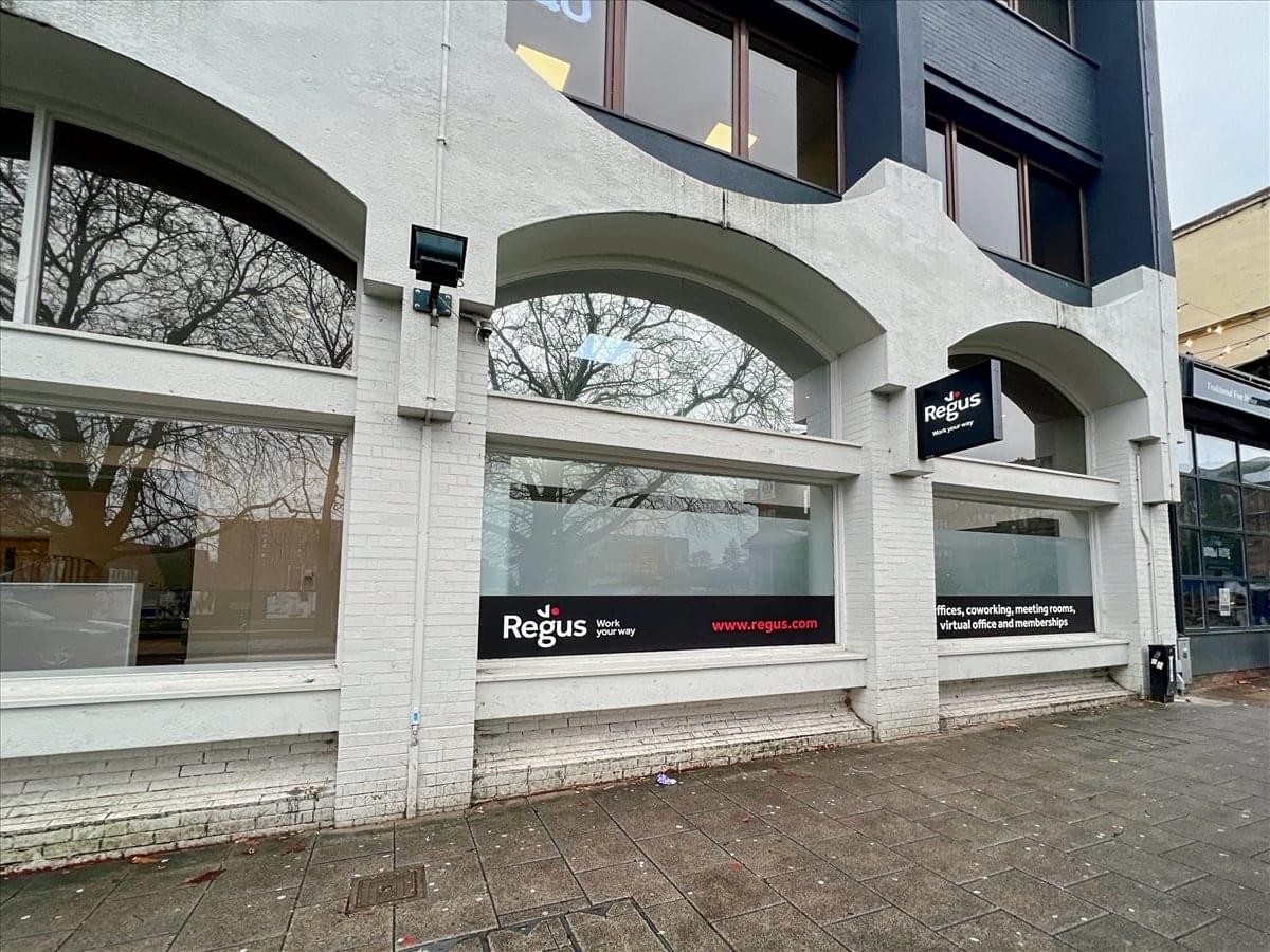 Exterior facade of the white and dark blue building at 9 Little Park Street, Coventry.