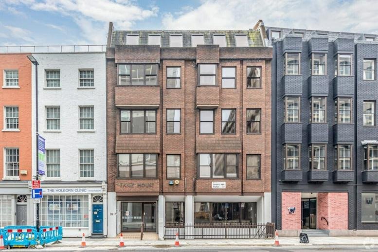 Exterior view of the brick and stone facade of 99, Grays Inn Road, London.