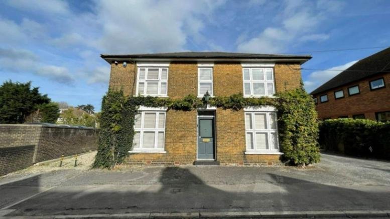 Exterior view of the brick facade at Adelaide House, 12 King’s Edward Road.
