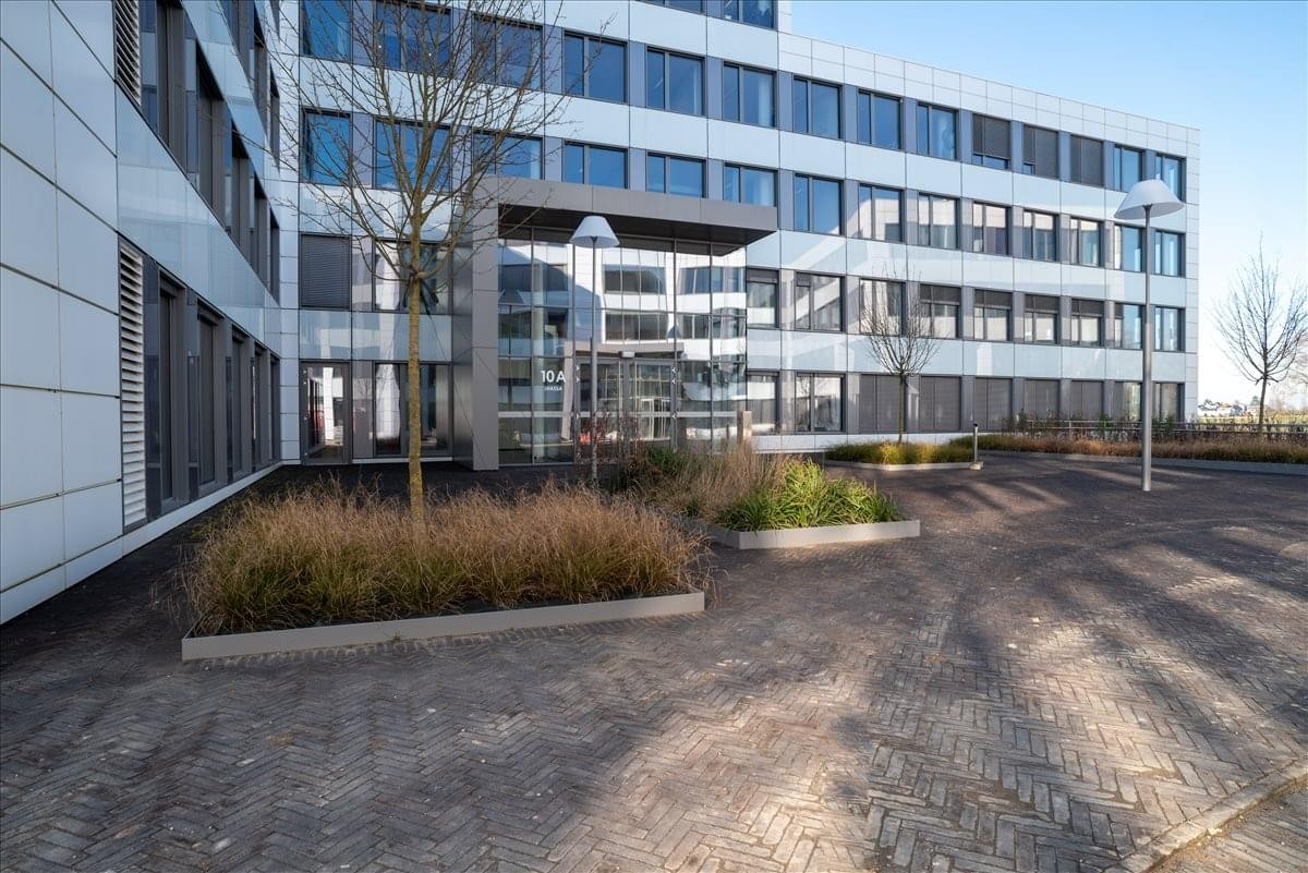 Exterior view of the modern glass and steel facade at Altitude, 12, Rue du Chateau D’eau.