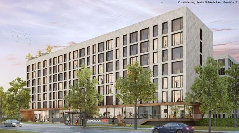 Exterior view of the modern stone-facade building at Am Kavalleriesand 5.