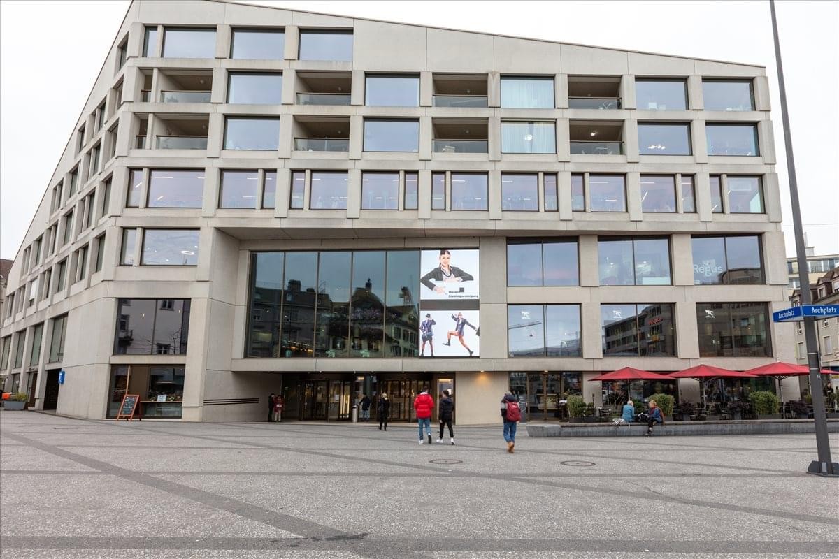 Exterior view of the contemporary stone and glass building at Archplatz 2, Winterthur.