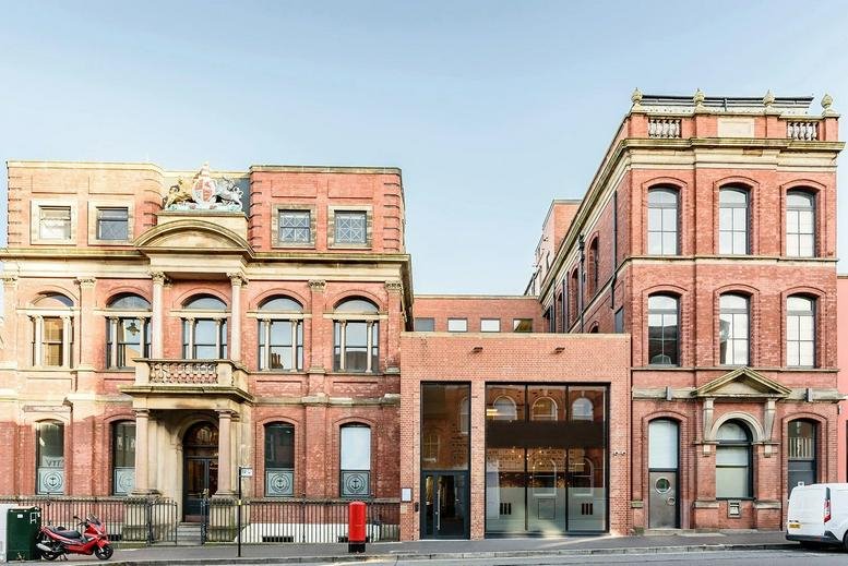 Grand brick exterior facade of Assay Studios, 141 Newhall Street, Birmingham.