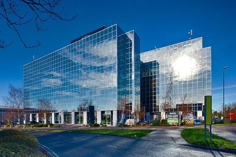 Exterior view of the glass-facade Astral Towers, Betts Way, Crawley.