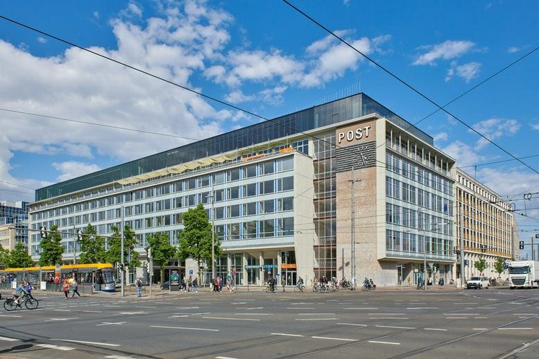 Exterior view of the grand glass and stone building at Augustusplatz 1-4, Leipzig, Saxony.