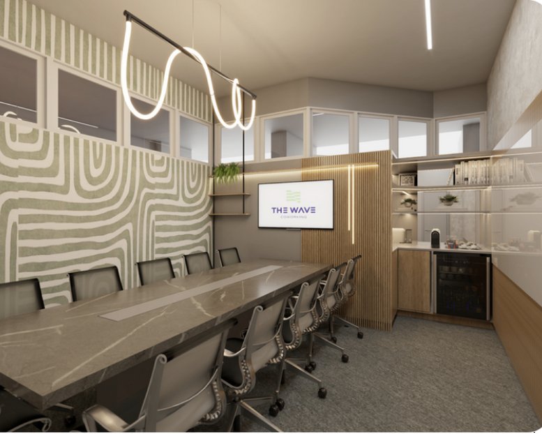 Spacious boardroom at Av Com. Lusíadas, Blc. 02 Fração J Clube Praia da Rocha, Portimão with a stone table.