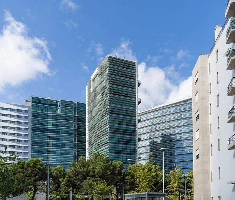 Exterior view of the glass-facade Avenida Dom João II nº11, Torre A, Lisbon building.
