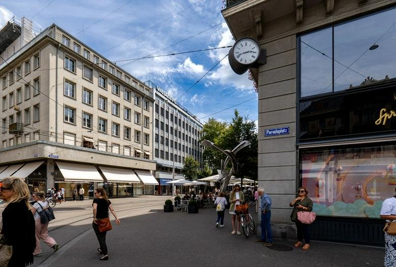 Exterior view of the classic stone facade building at Bahnhofstrasse 22, Zurich.