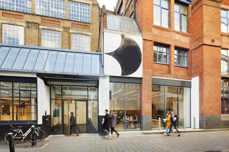 Exterior street view of the brick and glass facade at Barley Mow Centre.