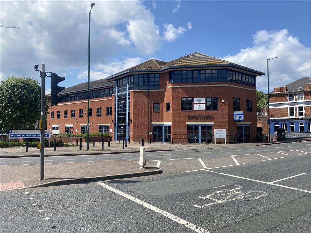Exterior view of the brick facade at Lock House on Castle Meadow Road.