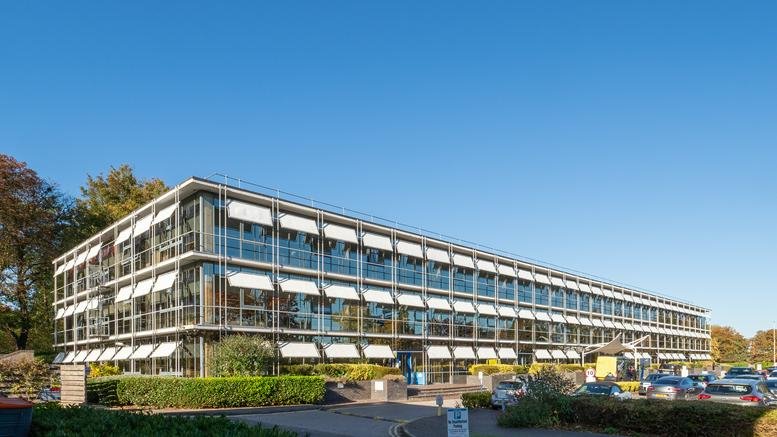 Exterior view of the four-story facade of Challenge House, Sherwood Drive, Milton Keynes.