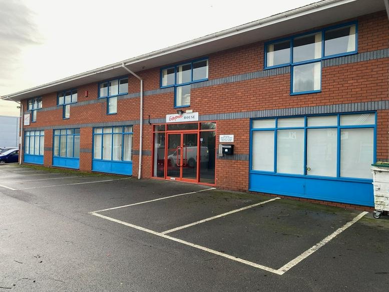 Exterior view of the brick facade and entrance of Cherry Orchard Lane, Salisbury, Wiltshire.