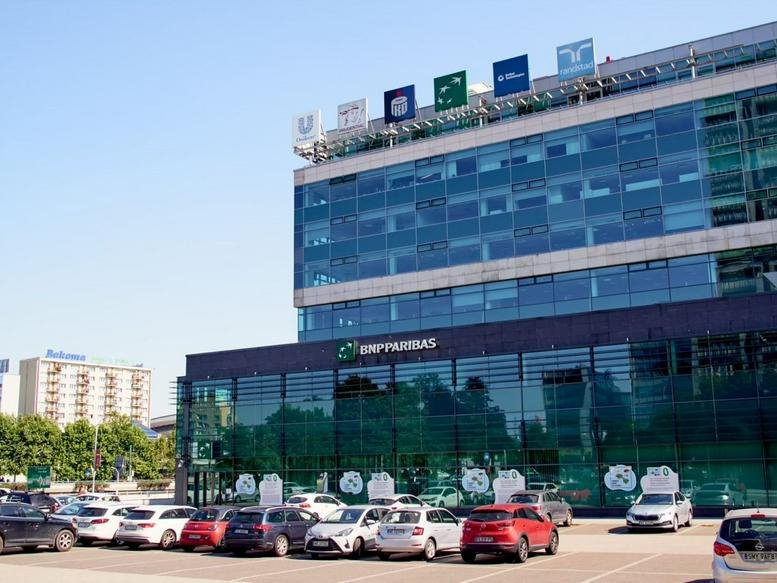 Exterior view of the modern glass facade office building at Chorzowska Street 6.