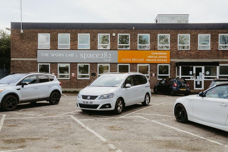 Exterior view of the brick building at Claydons Lane, The Work Lab, Rayleigh, Essex with a branded sign.