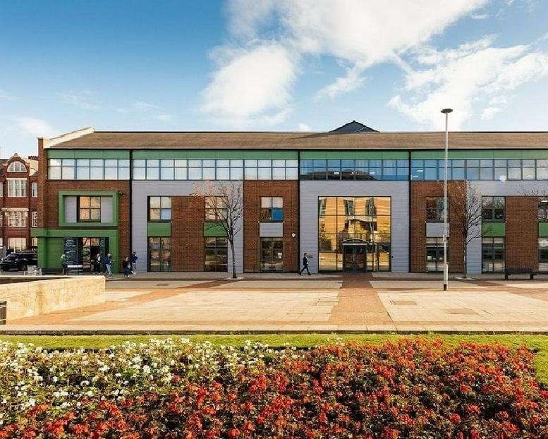Exterior view of the brick and glass facade at Cleveland Business Centre.