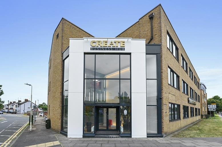 Exterior view of the brick facade and glass entrance at Criterion House, 40 Parkway.