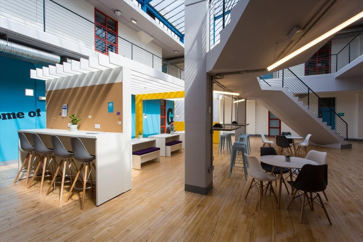 Modern interior of Design works, William Street, Gateshead, Tyne & Wear with high ceilings and a social breakout area.
