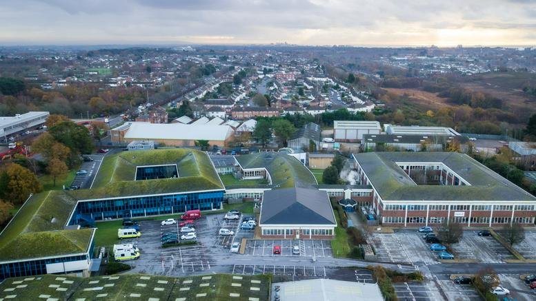 Aerial view of the Discovery Court, 551-553 Wallisdown Road office campus with green roofs.