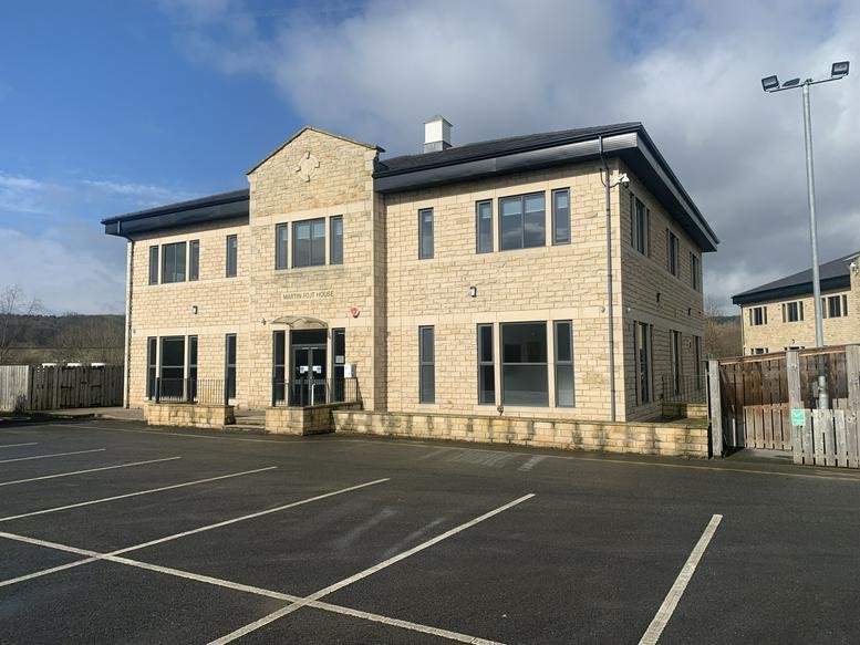Exterior view of the stone-facade building at Dowley Gap Lane, Aire Valley Park.