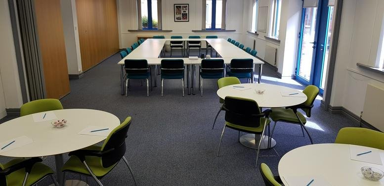 Spacious meeting room at Dudley Court South, The Waterfront, Level Street, Brierley Hill with modular U-shaped tables.