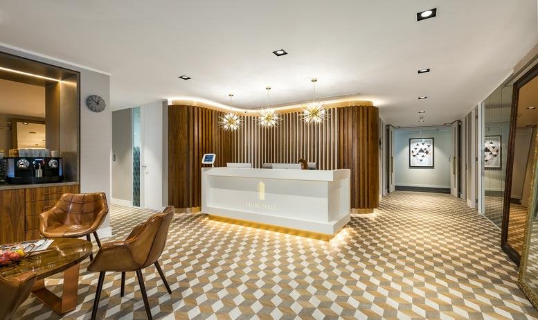 Modern lobby and reception area at Ealing Cross, 85 Uxbridge Road, London with geometric floors.