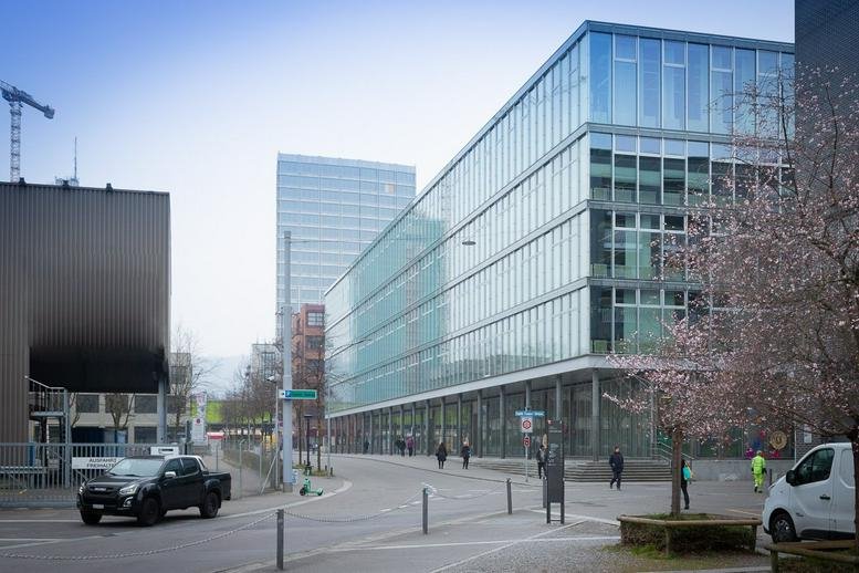 Exterior view of the glass-facade Dino Center at Elias-Canetti-Strasse 2.