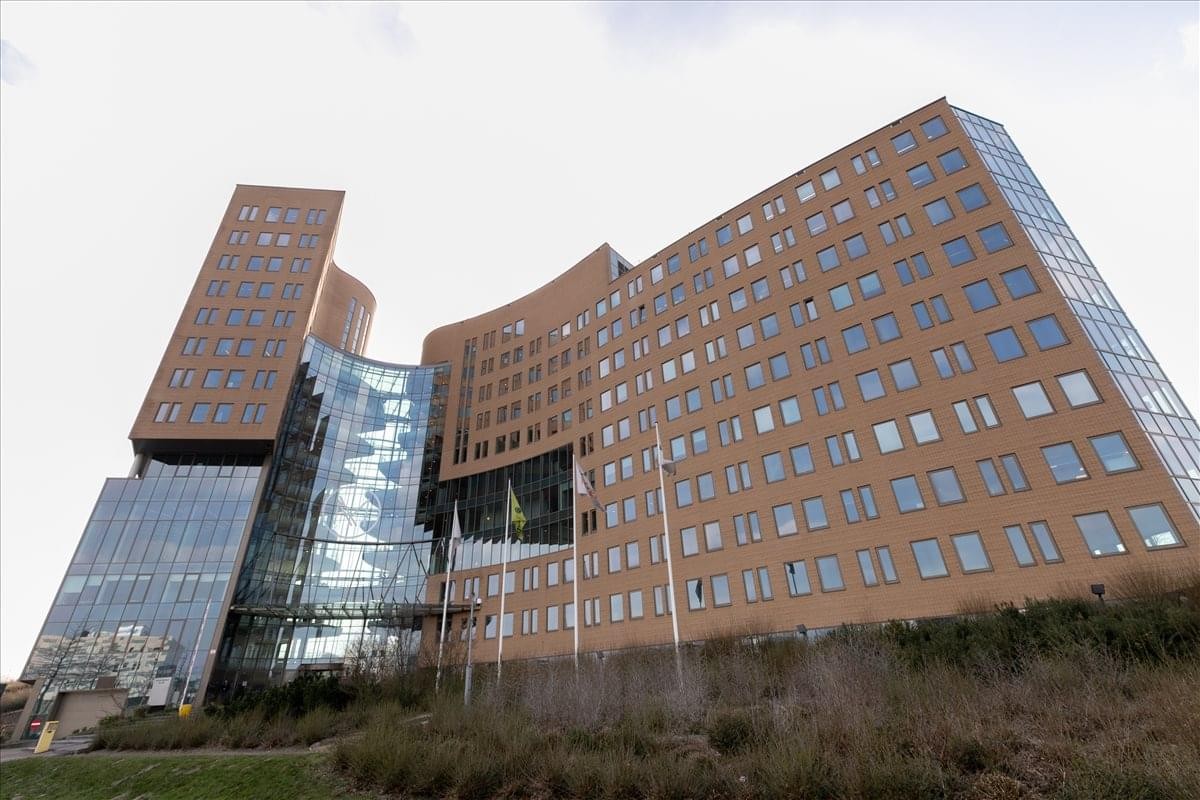 Modern exterior of the brick and glass office building at Fascinatio Boulevard 200.