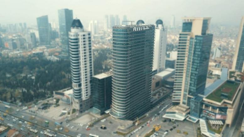Exterior view of the contemporary high-rise glass-facade towers of Ferko Signature in Istanbul.