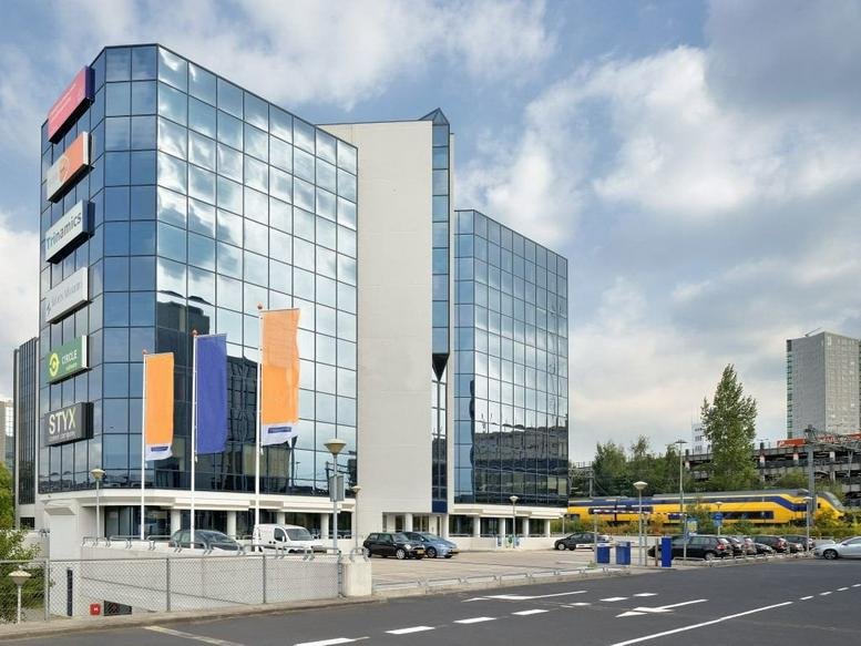Exterior view of the glass-facade FRITS building at Fellenoord 200.