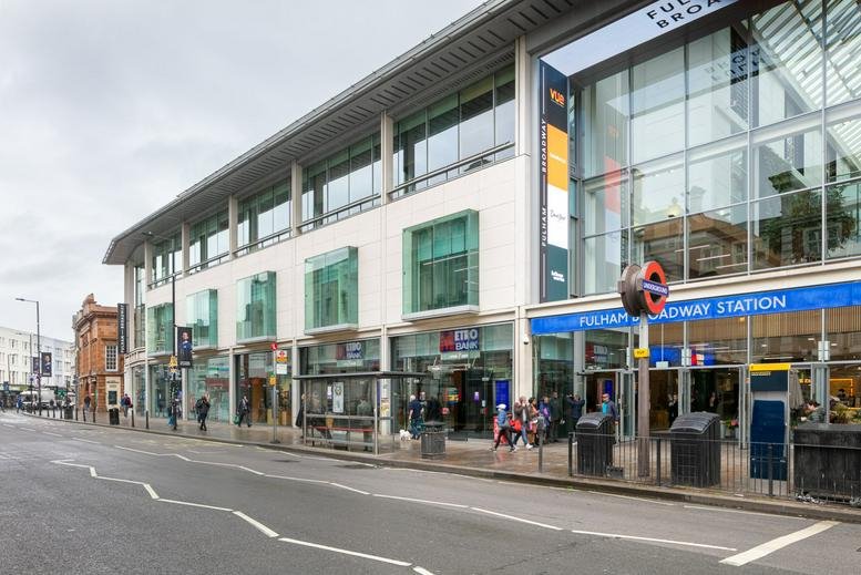 Exterior view of the modern Fulham Broadway Centre facade with large glass windows and entrance.