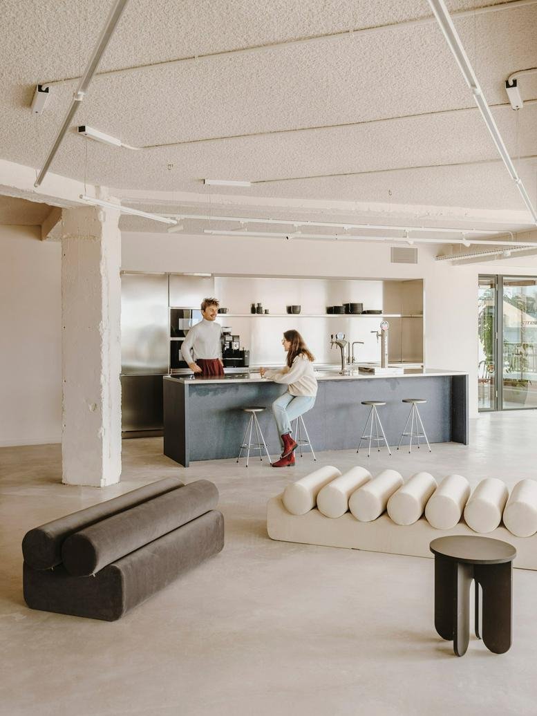 Spacious communal kitchen and breakout area at 645 Gran Via de les Corts Catalanes.